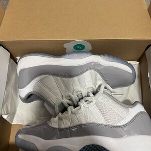 Jordan 11 Retro Low GS in White and University Blue